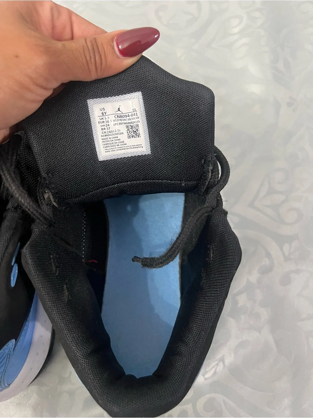 Jordan Black and Light Blue High-Top Sneakers size 6